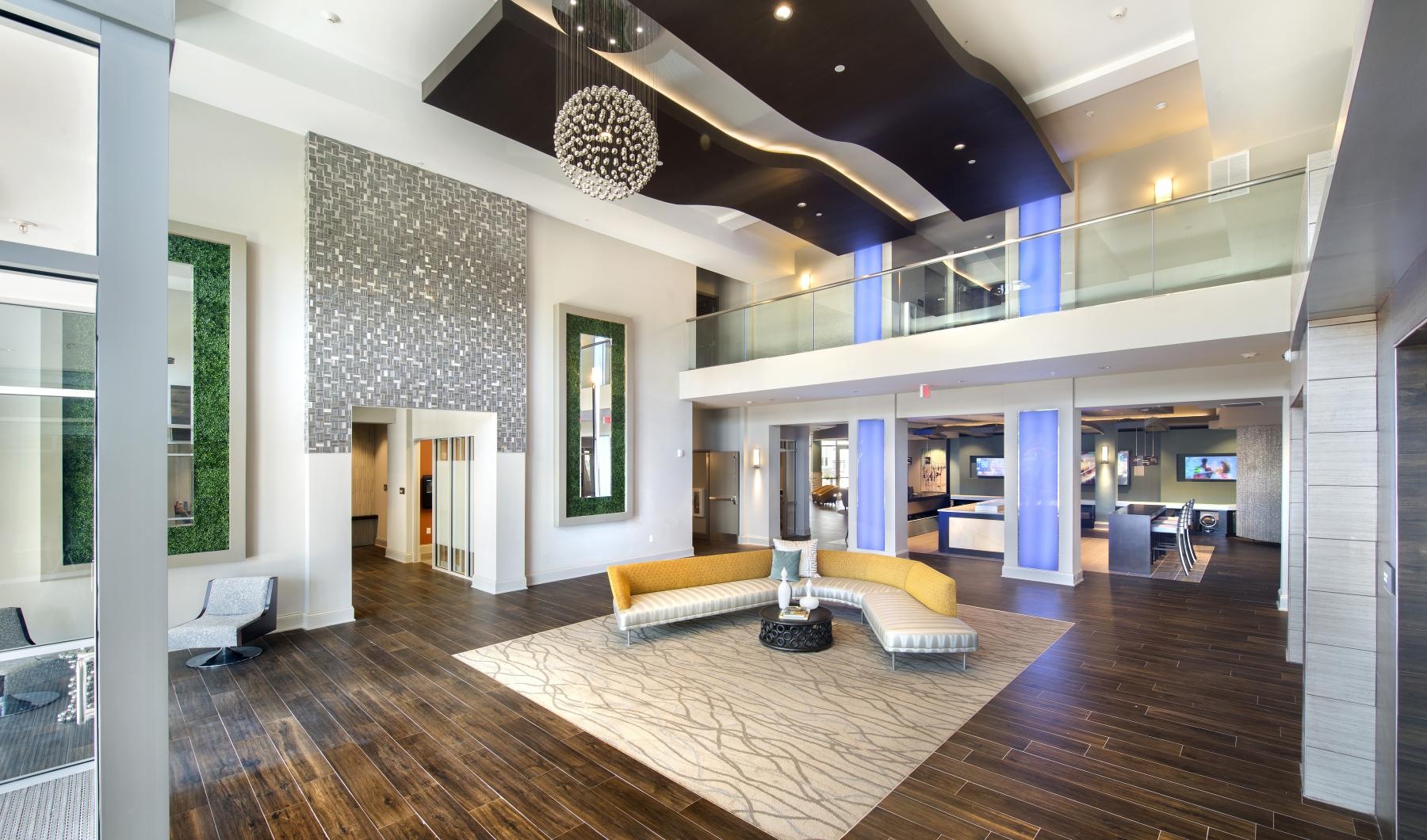 a large living room with a wood floor